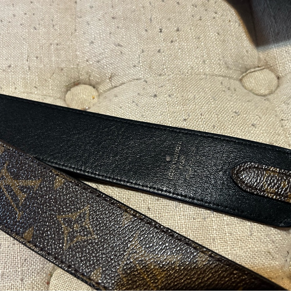 Louis Vuitton guitar strap to turn you bag into messenger bag.
